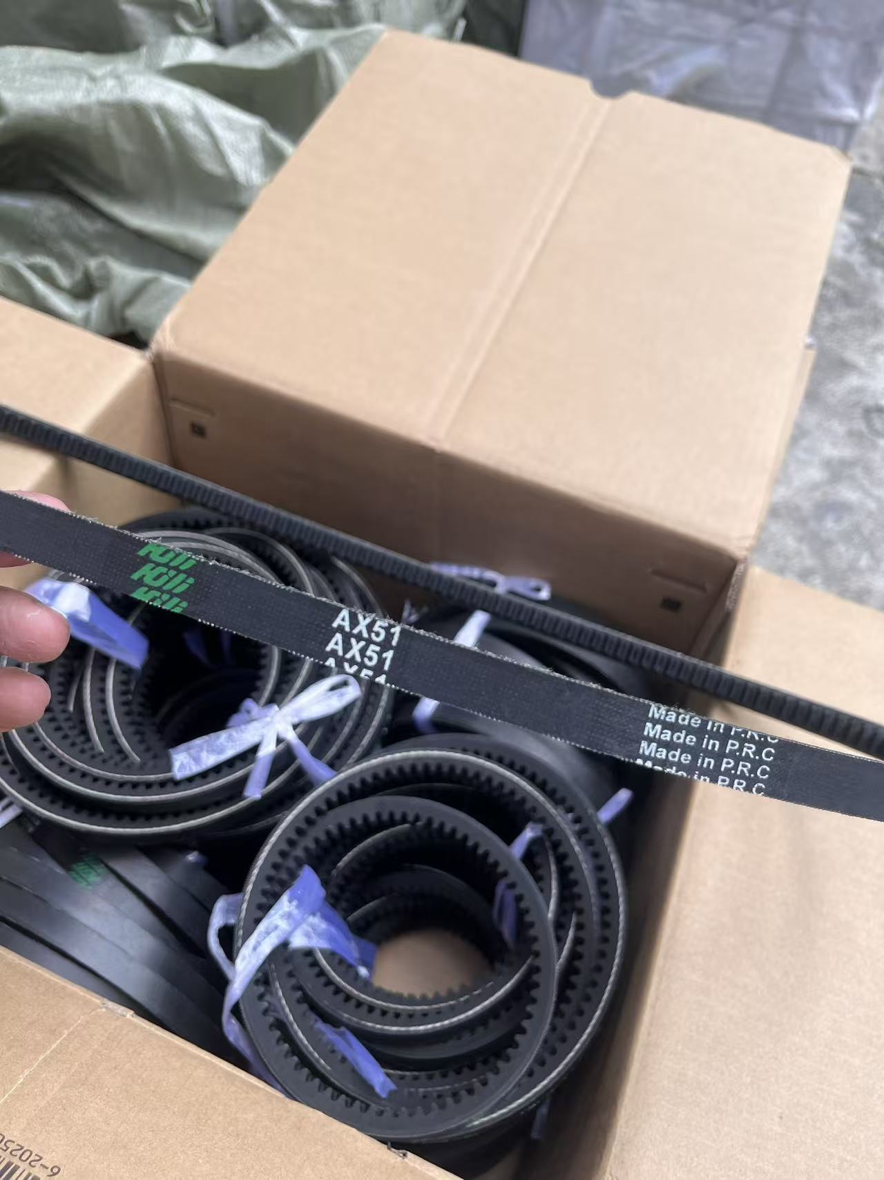 Automotive belts packed in cartons